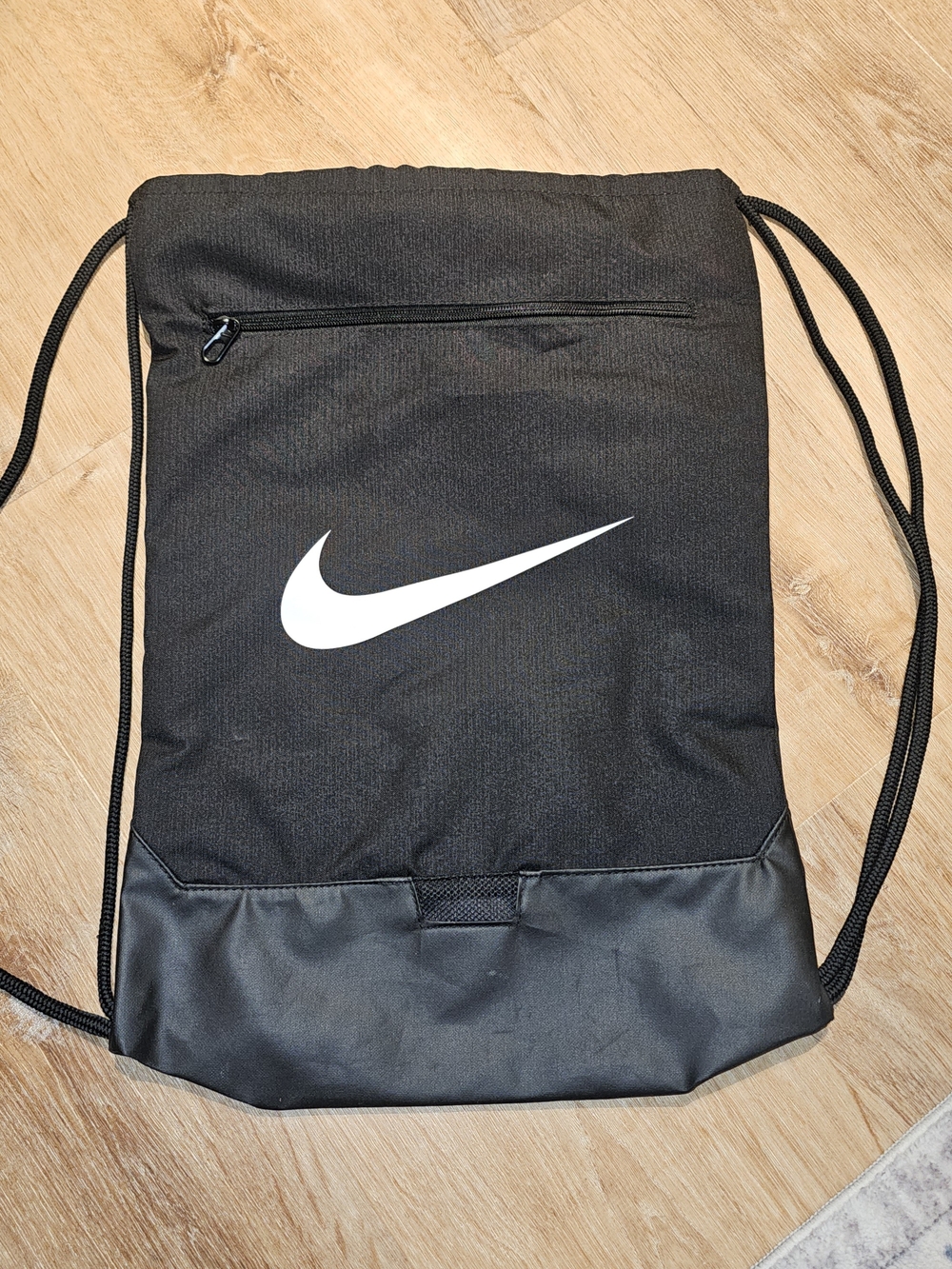 Nike Black Drawstring Backpack with White Swoosh